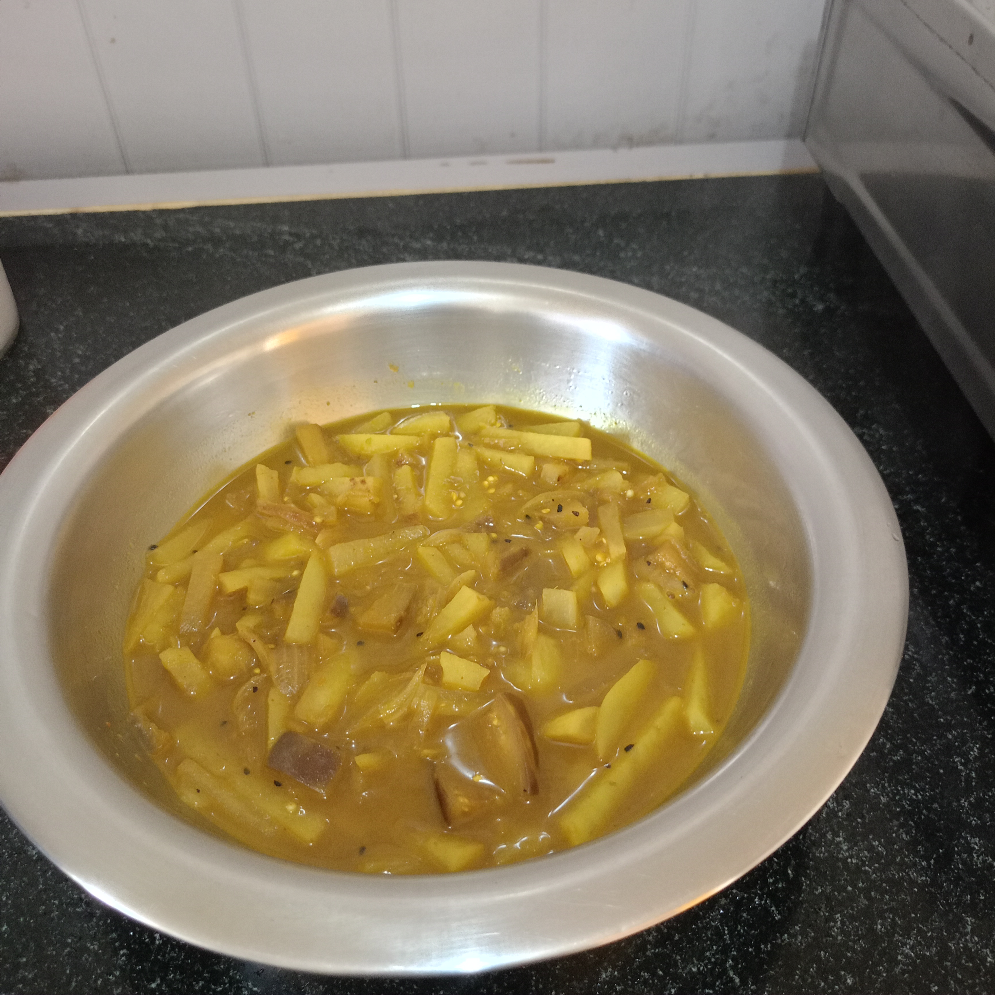 Homemade Aloo Baingan Curry with potatoes and brinjal