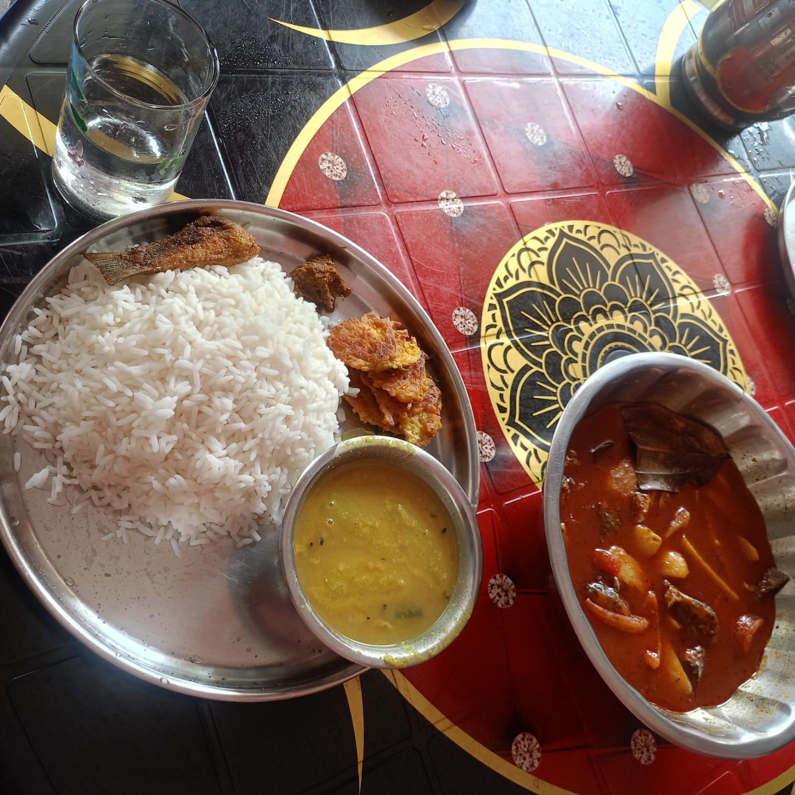 Bengali Macher Jhol served with steamed white rice
